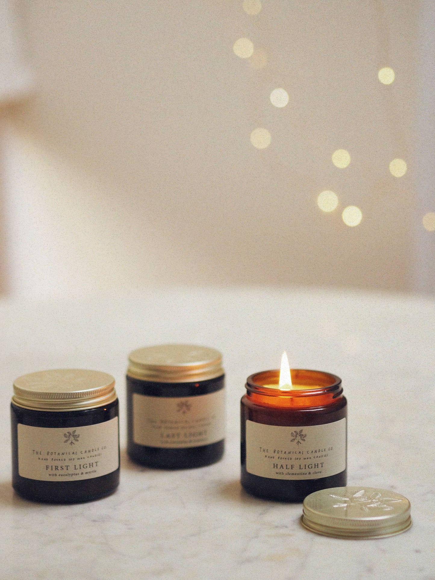 Festive Candles in Amber Glass Jars