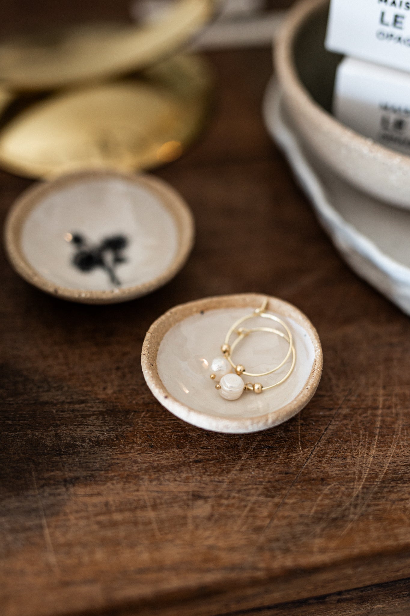 Petite Pair of nesting Ceramic Dishes w/ Floral inprint