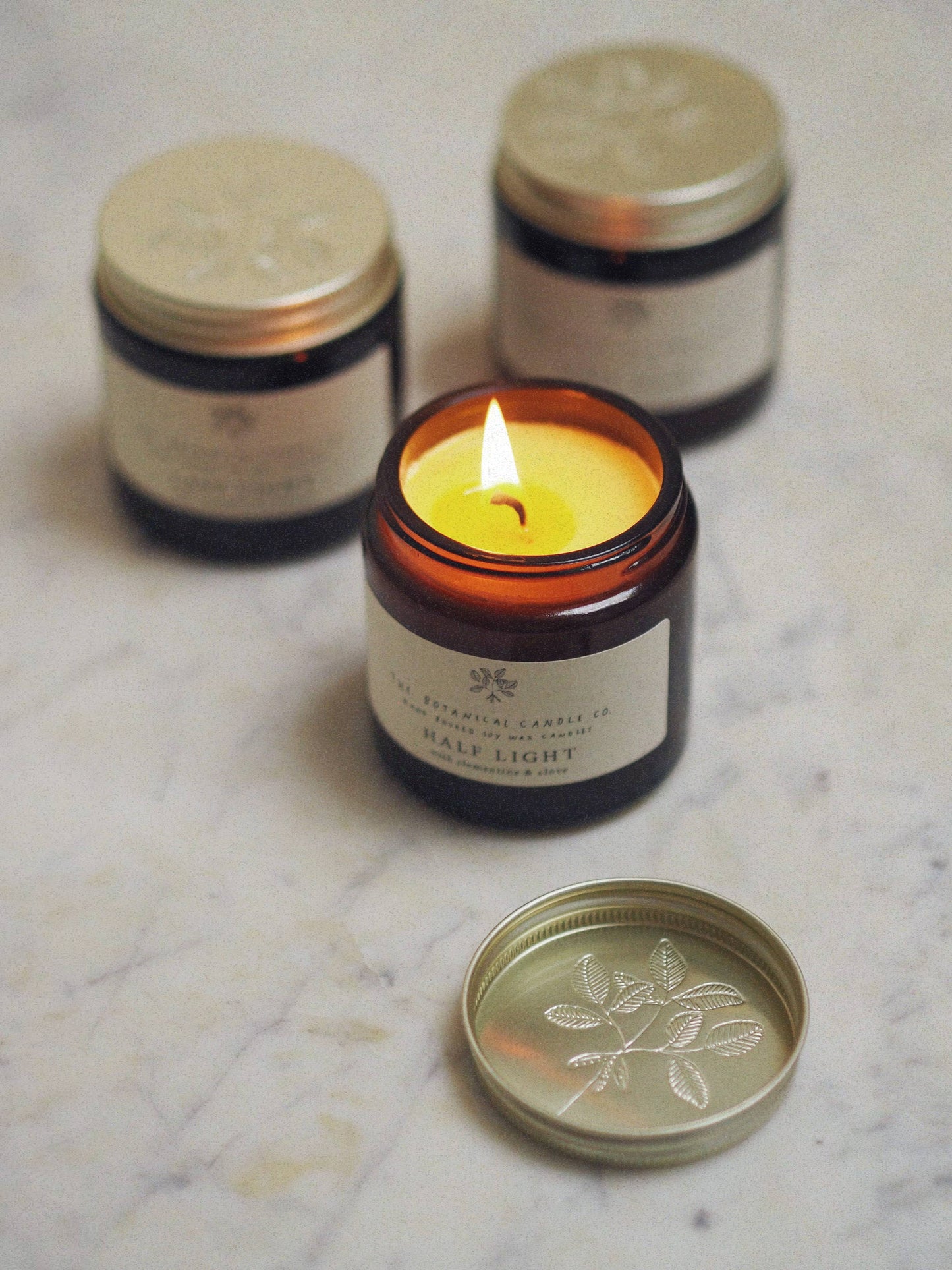 Festive Candles in Amber Glass Jars