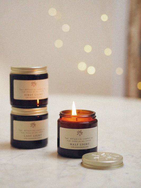 Festive Candles in Amber Glass Jars